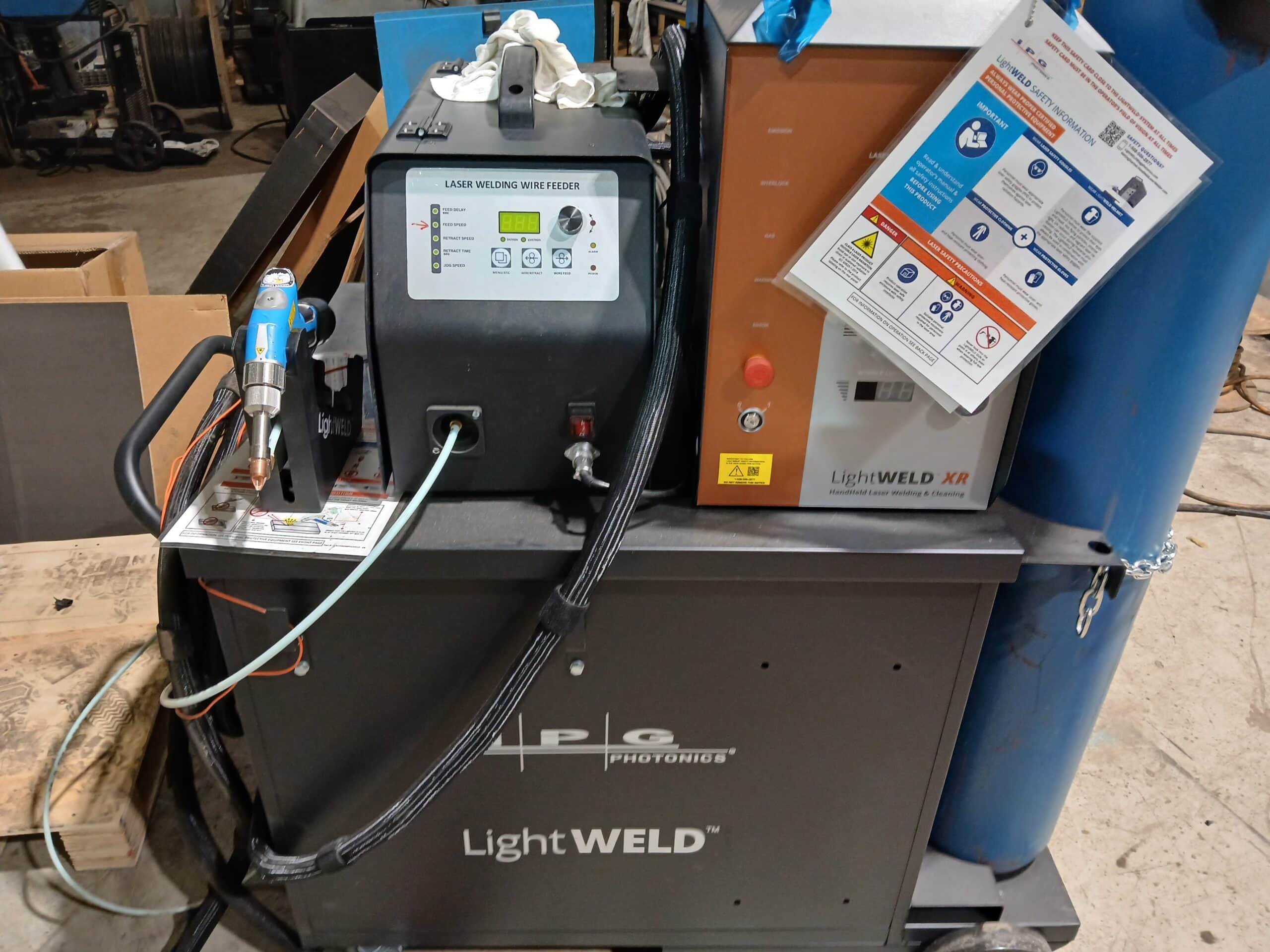 TCM technician using LightWELD XR handheld laser welding system