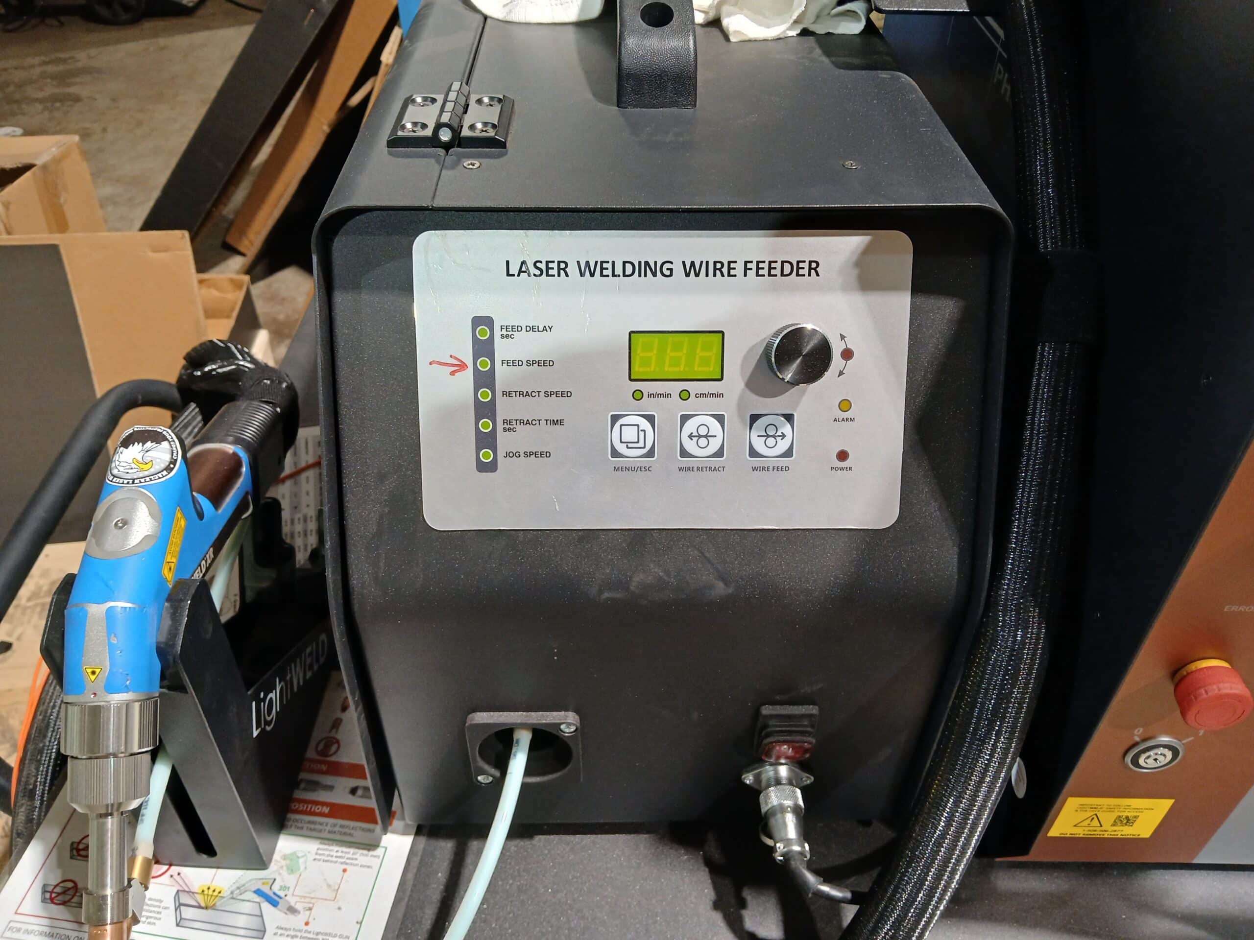 Handheld laser welding wire feeder system at TCM